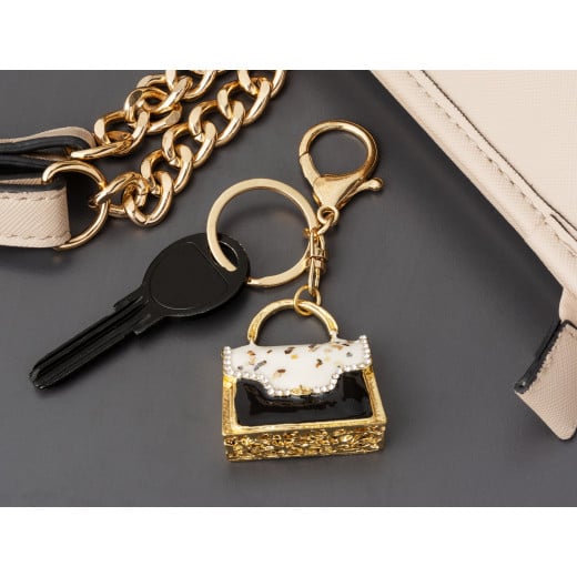 مدام كوكو - ميدالية مفاتيح بشكل حقيبة باللونين الأسود والأبيض