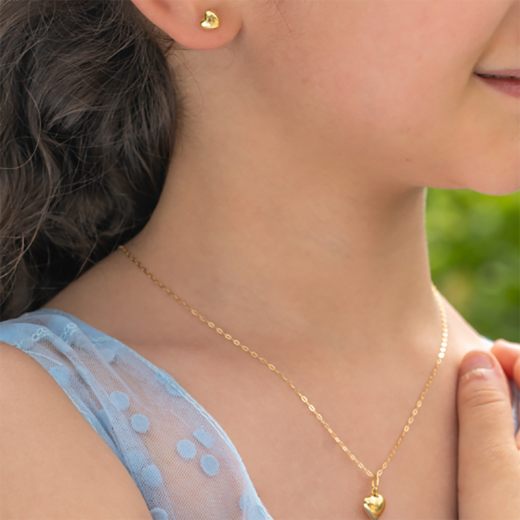 simple heart shaped gold set of stud earrings and pendent with chain